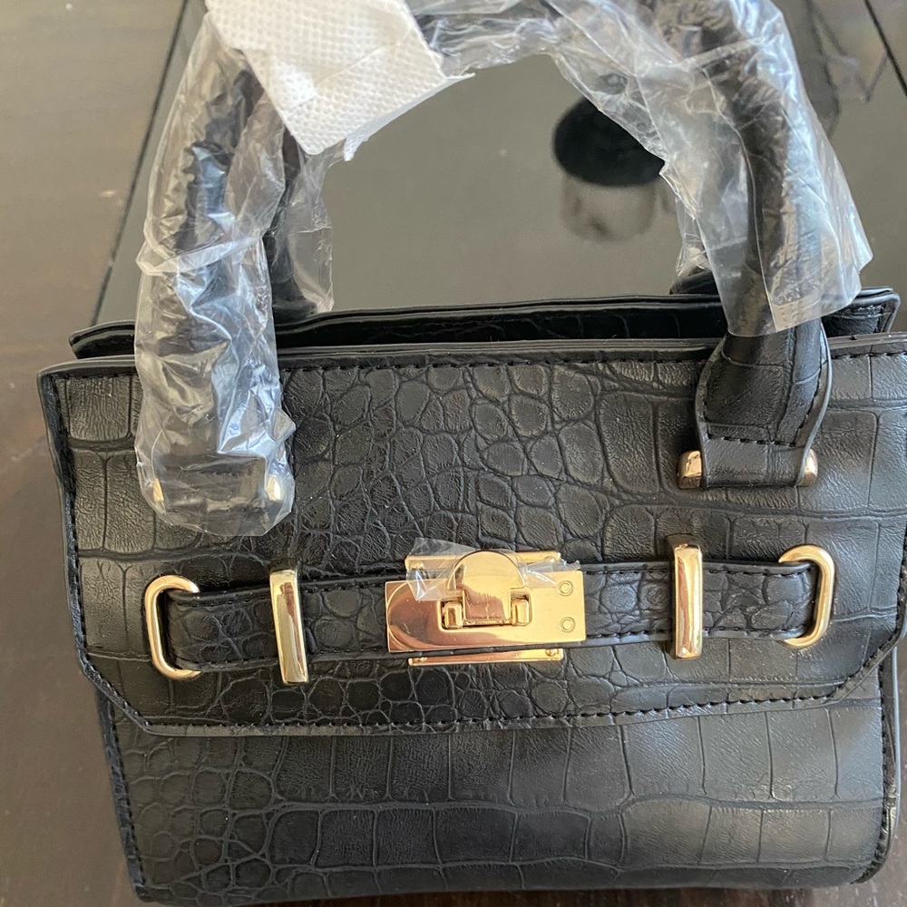 Bebe black and gold bag
